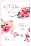 The image shows a Mother's Day card designed like a floral daydream, the kind of card you might tuck beside a bouquet delivered to a Bow doorstep on a bright spring morning. Across the front, blush and rose-pink flowers are arranged in loose yet thoughtful clusters, with the largest bouquet positioned prominently and smaller groups echoing it, as though scattered along a gentle breeze. Each rose is rendered with layers of soft, rounded petals, some curling back at the edges, others cupping tightly around the heart of the bloom. There are hints of velvety depth and subtle highlights, giving these printed flowers an almost touchable realism, like fresh roses from a Bow florist's cooler. A sprinkling of detached petals lies across the card, creating a poetic, slightly wistful effect, as if they've fallen naturally from the main arrangement during a quiet breakfast-in-bed celebration. A pale, satin-like ribbon winds gently among the roses, tying the composition together with the same care a florist uses when finishing a hand-tied Mother's Day bouquet. Flowing script runs gracefully across the design, offering a warm, appreciative message that celebrates a mother's love and all she does. The tones remain soft and feminine, dominated by whites, creams, and varying shades of pink, with the lighting kept even and gentle, suggesting calm contentment rather than bold drama. Seen as a whole, the card feels like an intimate gesture from someone in Bow who has taken time to choose something beautiful and heartfelt, echoing the quiet joy of giving flowers and words of thanks on Mother's Day.